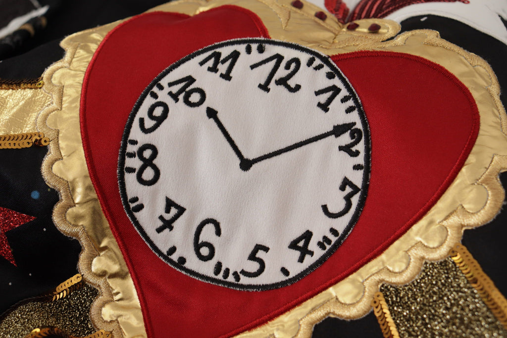 Jupe en sequins noire Dolce & Gabbana Love Clock avec motif piano, élégante et sophistiquée, vue de face sur fond neutre.