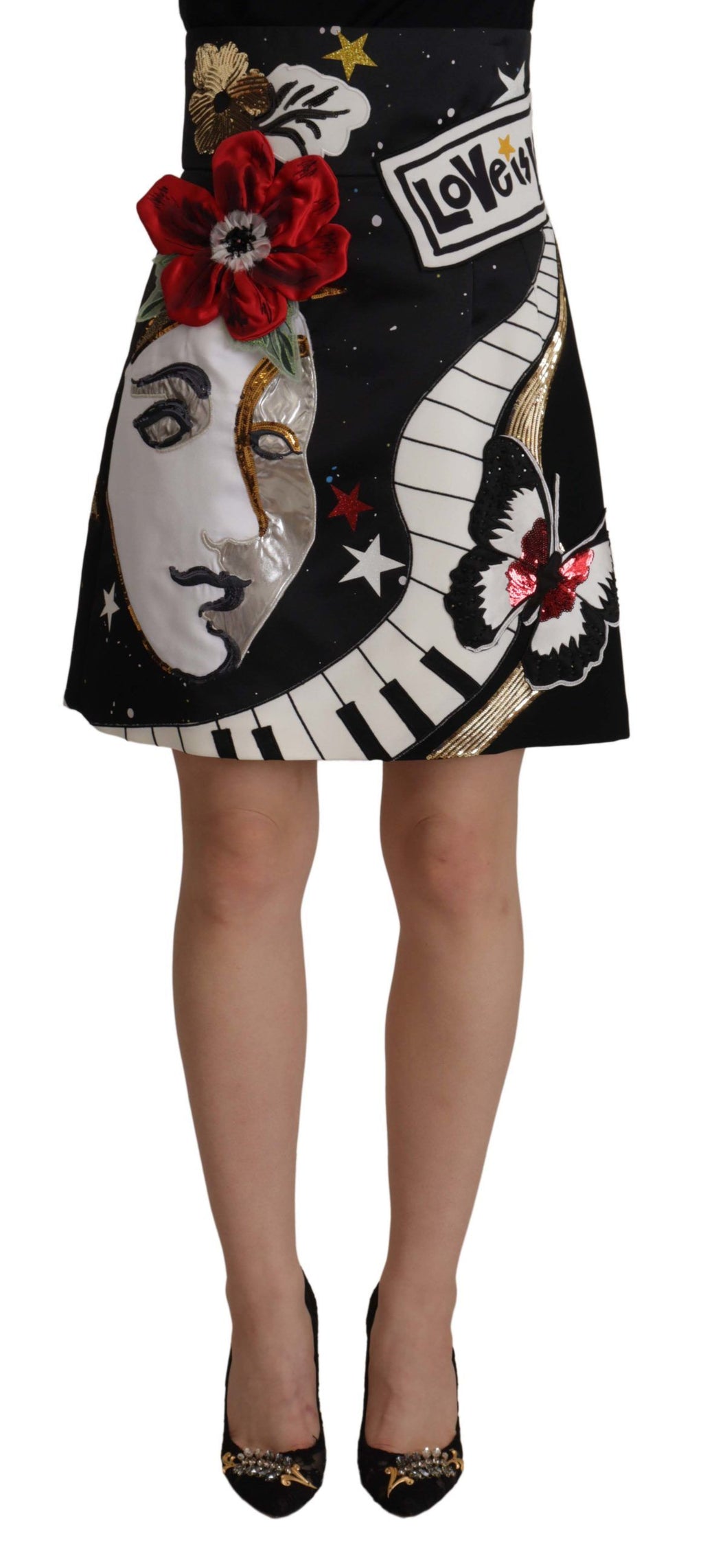 Jupe piano noire Dolce & Gabbana avec sequins et motif Love, style élégant et brillant pour femme.