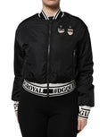 Veste bomber noire en nylon Dolce & Gabbana avec fermeture éclair complète, style élégant et logo de la marque visible.