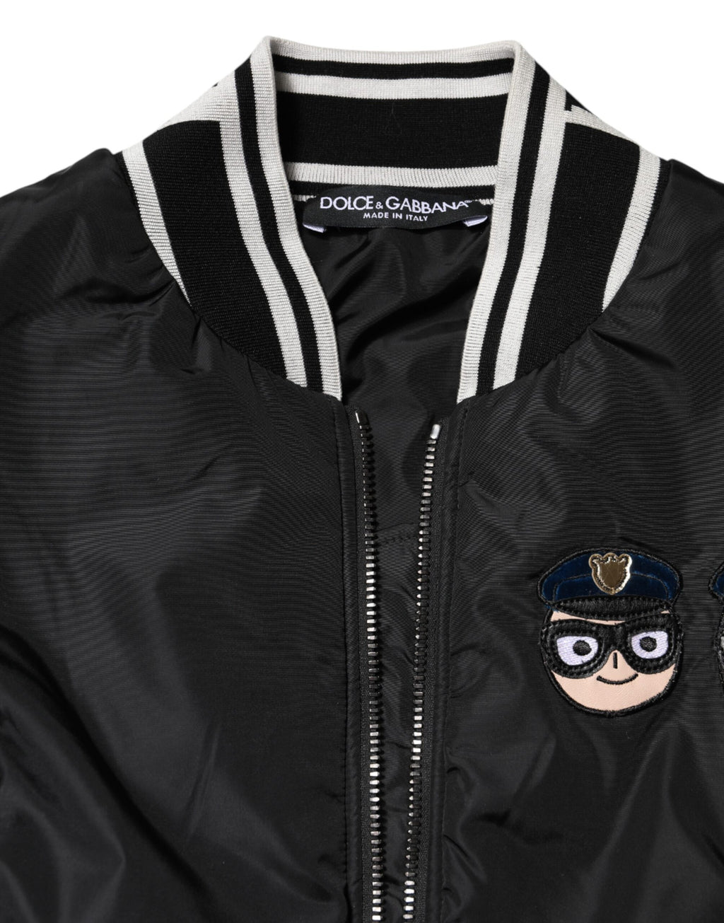 Veste bomber noire en nylon Dolce & Gabbana, fermeture éclair, style décontracté, détail logo DGFamily visible.