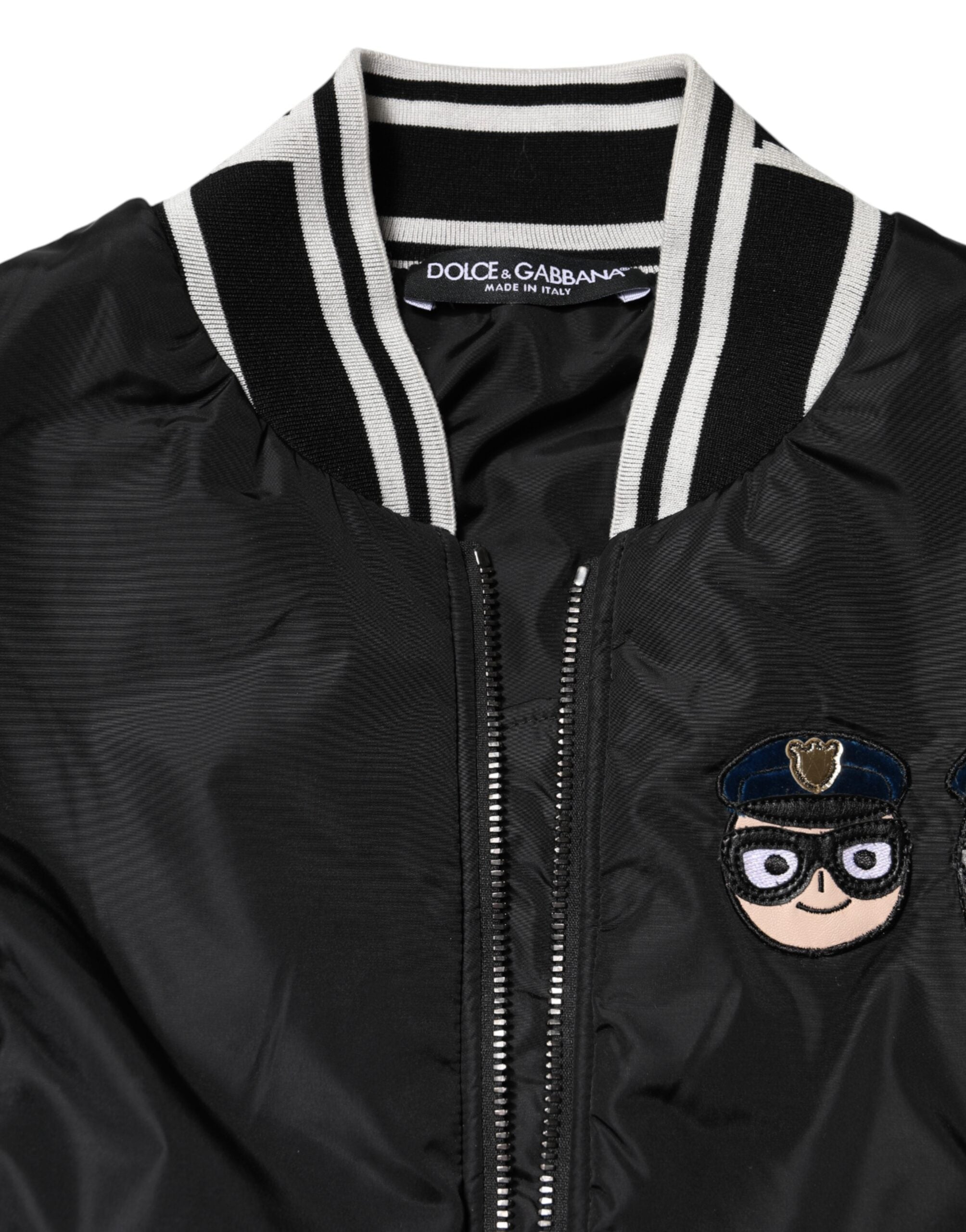 Veste bomber noire en nylon Dolce & Gabbana, fermeture éclair, style décontracté, détail logo DGFamily visible.