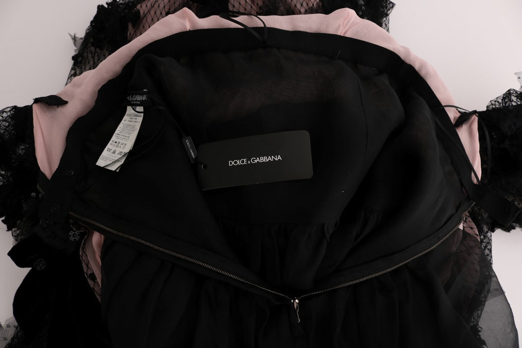 Robe droite en soie noire et rose de Dolce & Gabbana avec appliqués élégants, longueur mi-mollet, style sophistiqué.