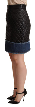 Mini jupe en cuir matelassé noir Dolce & Gabbana, style élégant et moderne, visible avec détails de couture et fermeture éclair.