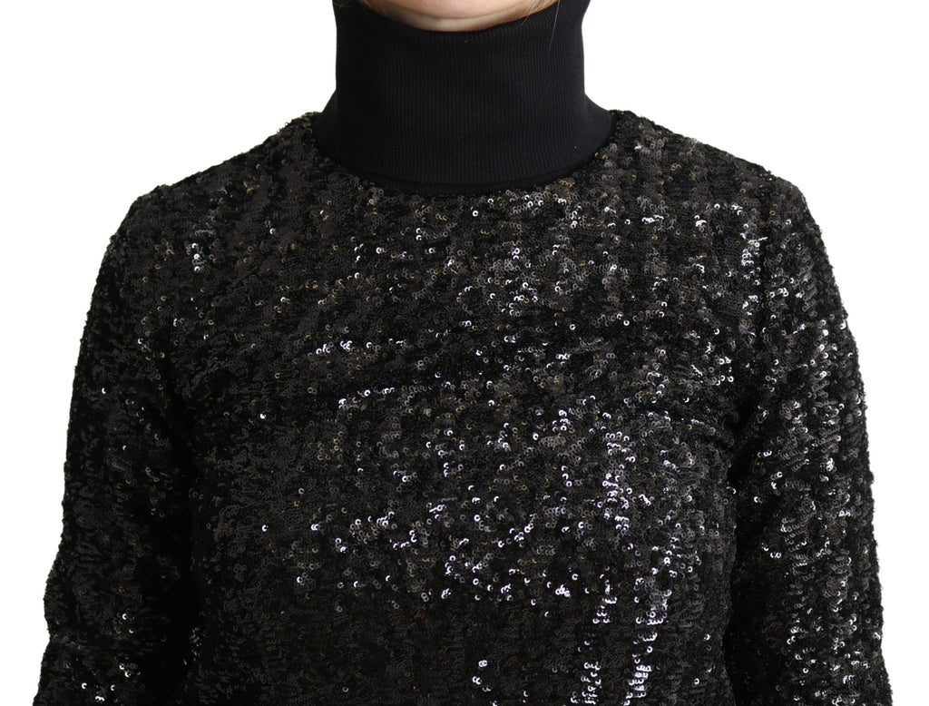 Pull noir Dolce & Gabbana en maille à sequins avec col roulé, élégant et chic, visible avec détails brillants en image.