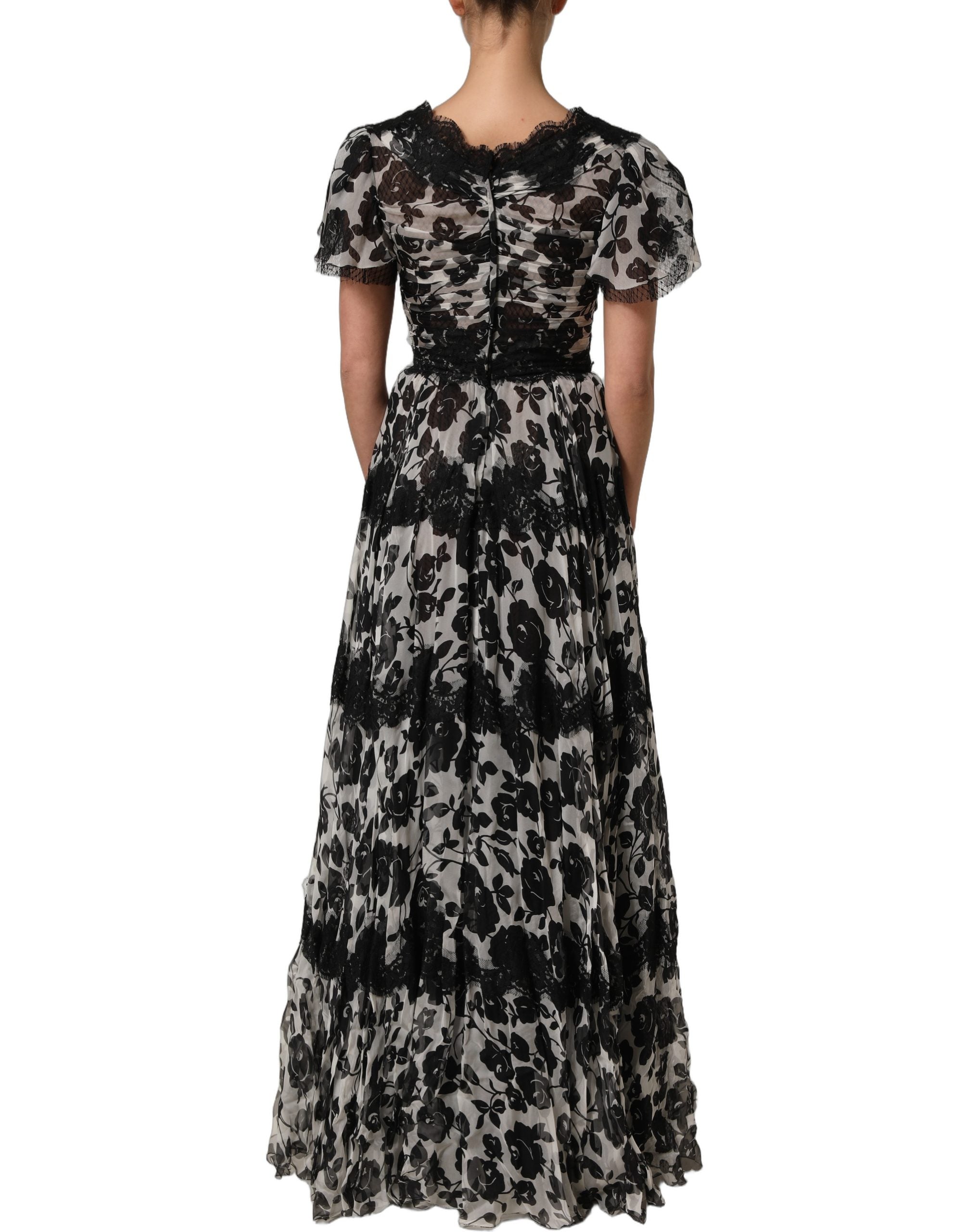 Robe maxi Dolce & Gabbana en soie noire avec broderie florale en dentelle et ricamo, élégante et sophistiquée.