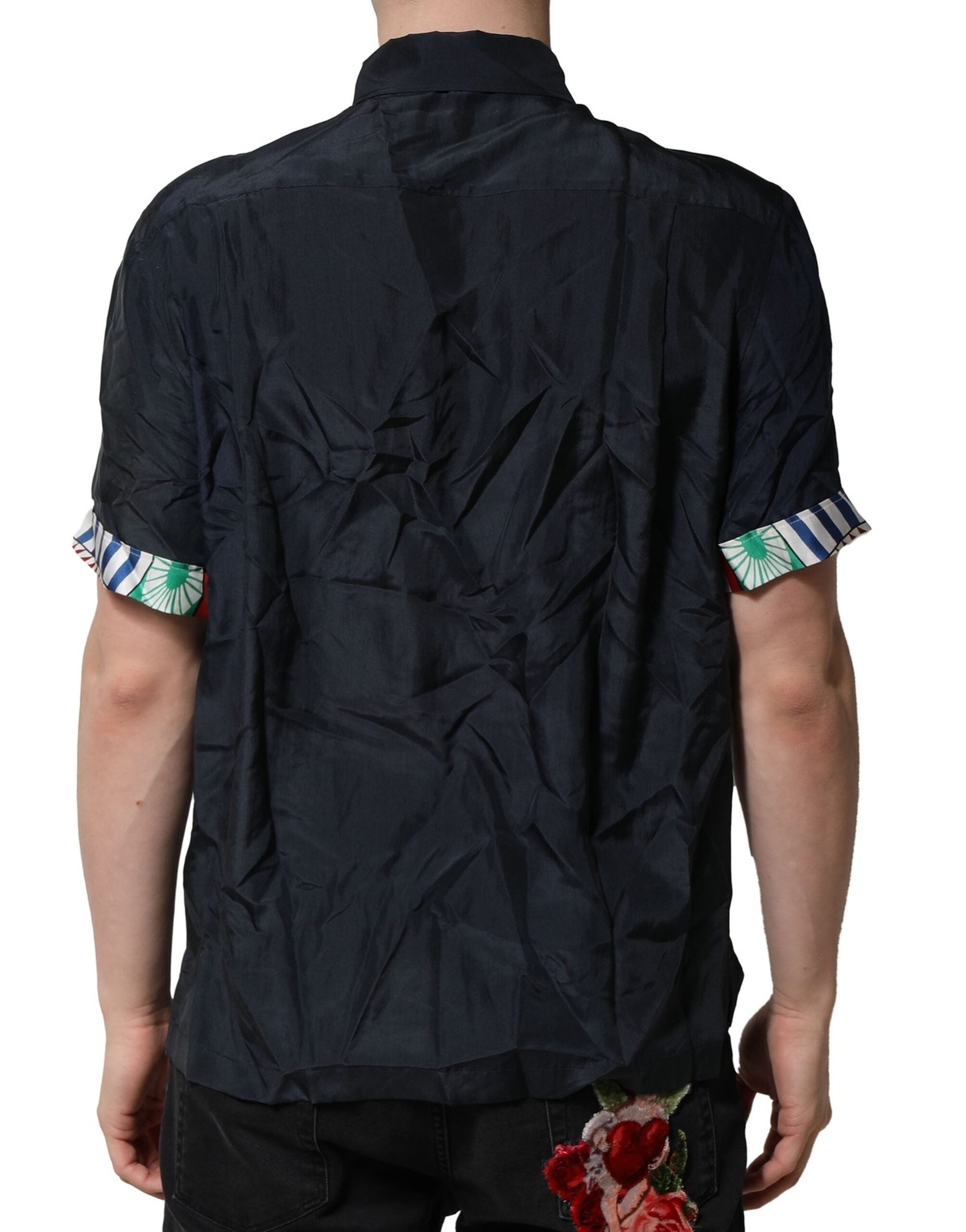 Chemise homme à manches courtes en soie noire Dolce & Gabbana, style décontracté et élégant, vue de face.