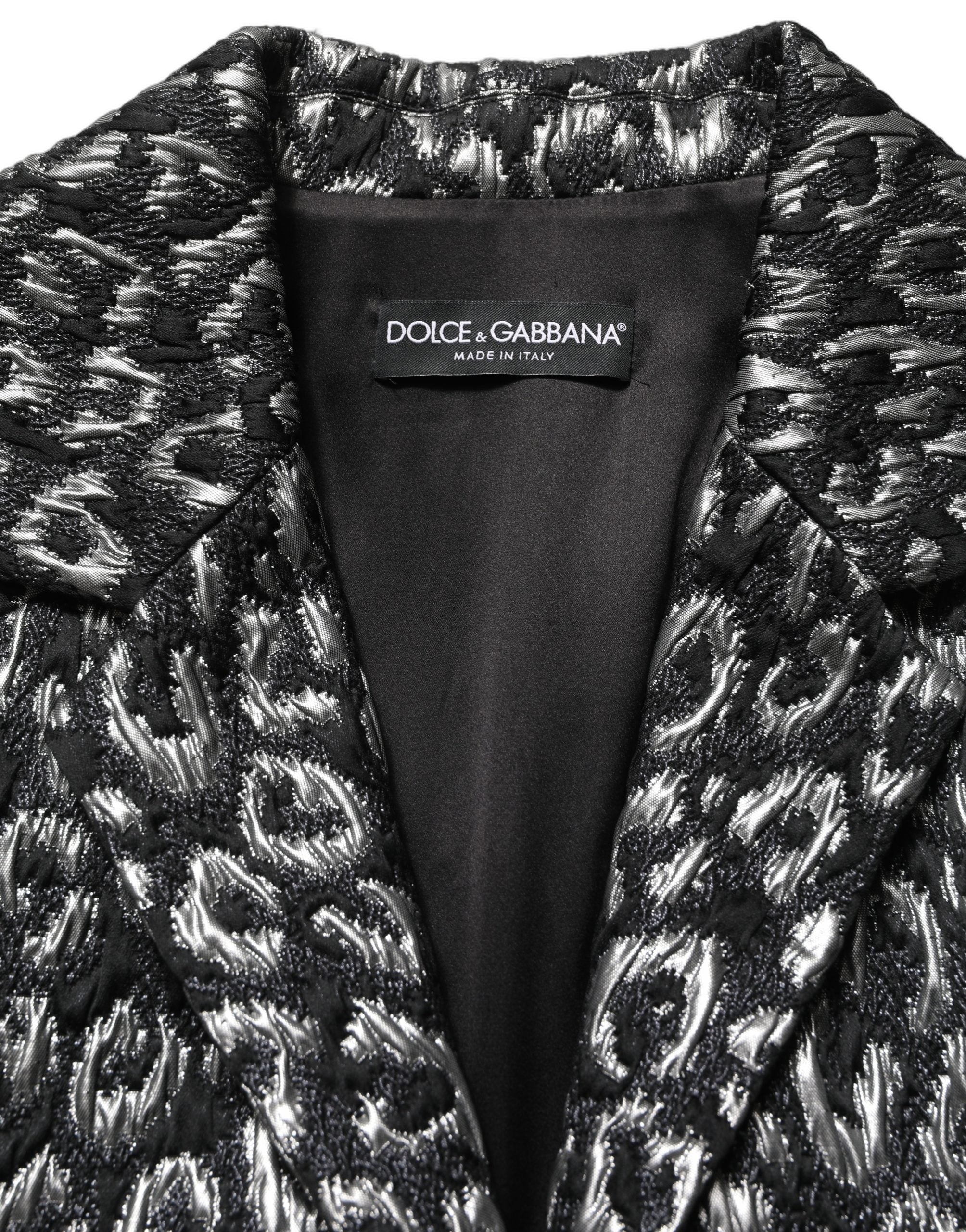 Veste en jacquard noir et argent Dolce & Gabbana avec motif léopard, manteau chic en tissu élégant.