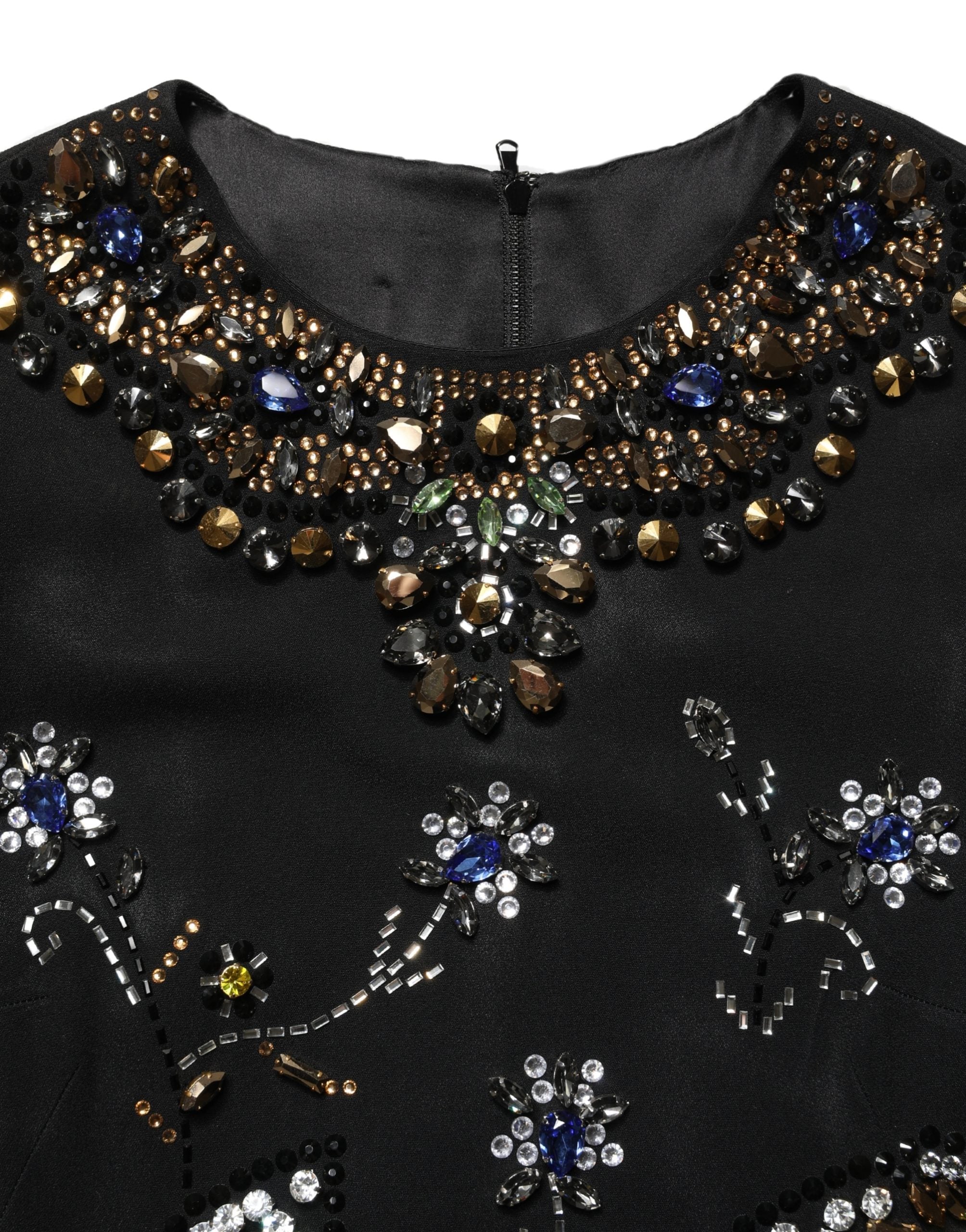 Robe sans manches Dolce & Gabbana noire avec motifs floraux, embellissements de perles et détails élégants.