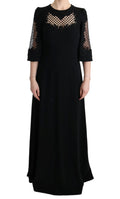 Robe longue noire Dolce & Gabbana, robe stretch ajustée, style shift maxi avec décolleté élégant et tissu fluide.