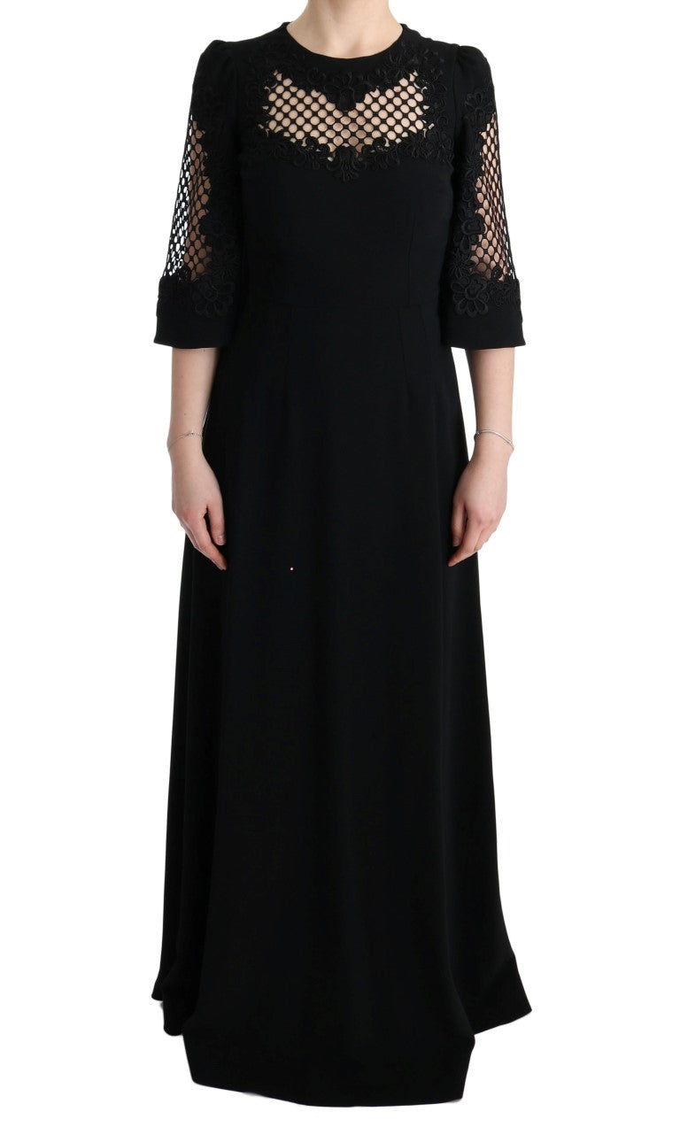 Robe longue noire Dolce & Gabbana, robe stretch ajustée, style shift maxi avec décolleté élégant et tissu fluide.