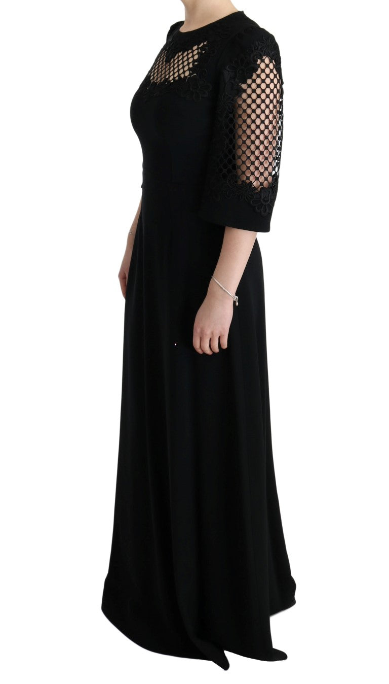 Robe longue noire Dolce & Gabbana en tissu stretch, style drapé et silhouette élégante pour une tenue sophistiquée.