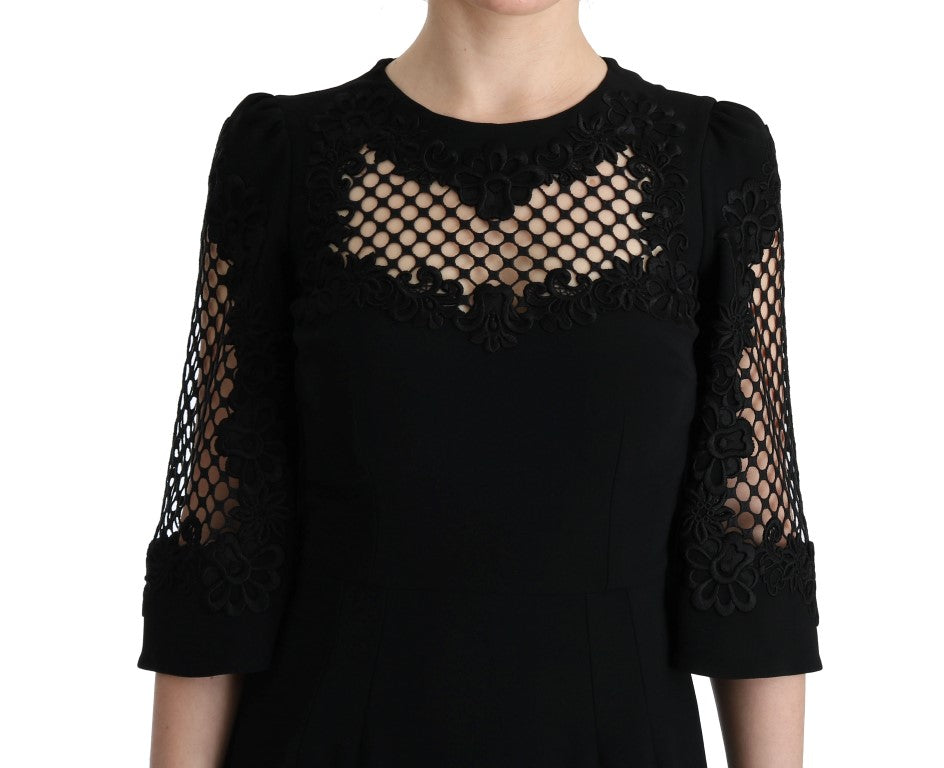 Robe longue noire Dolce & Gabbana, robe droite élastique, maxi élégante avec détails sophistiqués, vue de l'avant.