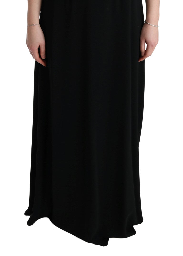 Robe longue noire Dolce & Gabbana stretch, style shift maxi, en tissu élégant, portée décontractée ou sophistiquée.