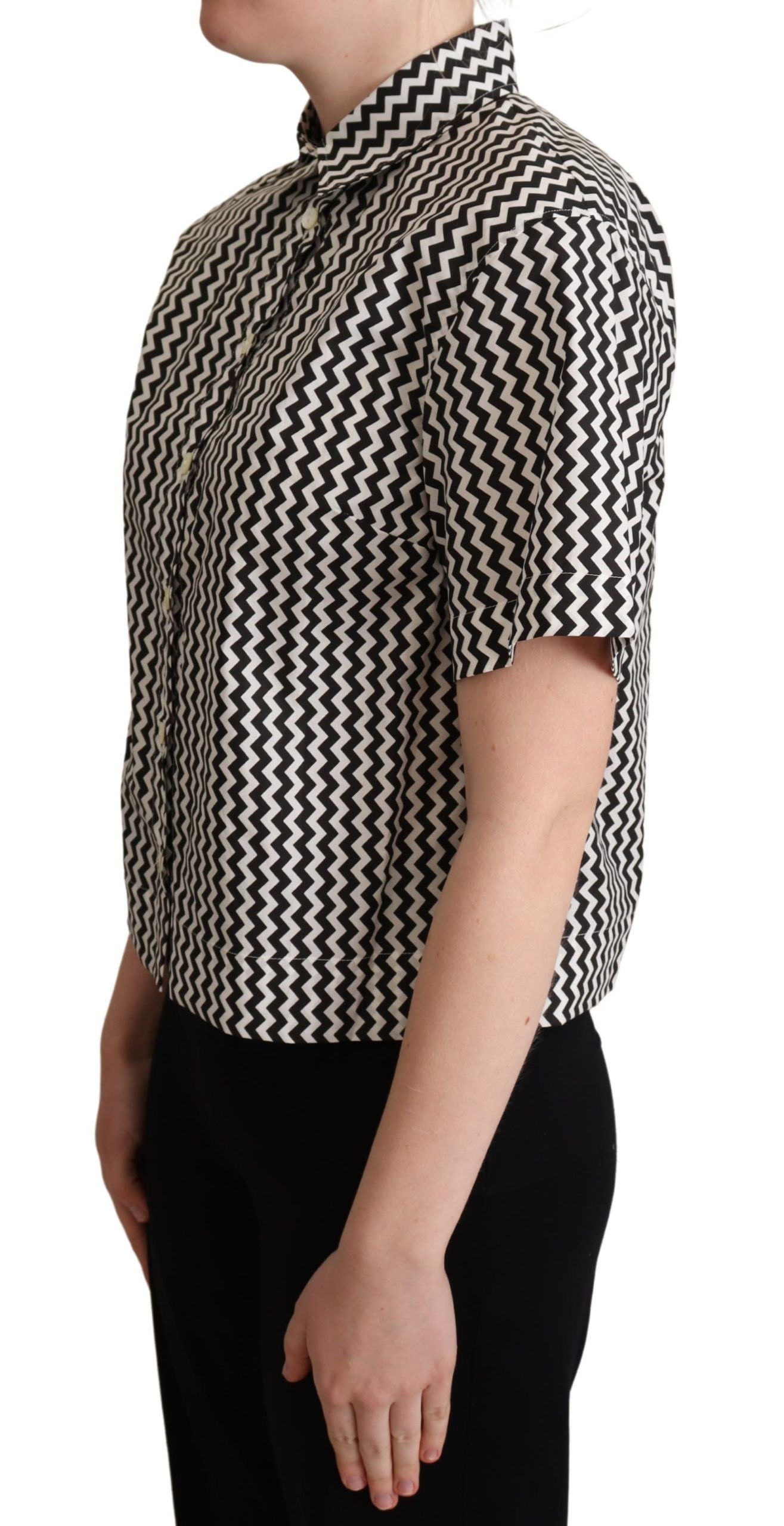 Chemise Dolce & Gabbana en coton noir et blanc avec col à motif zigzag, style élégant et moderne.