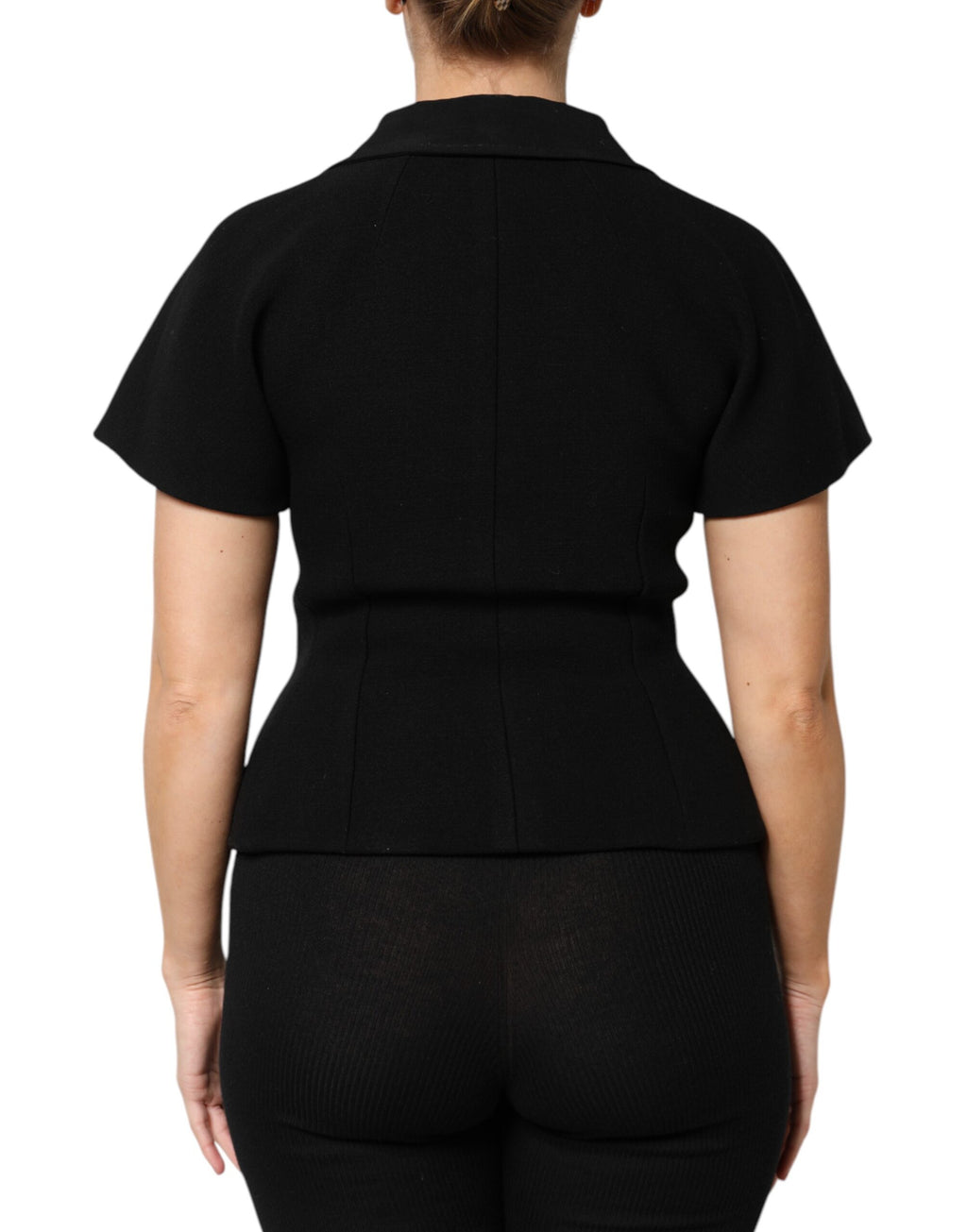 Manteau noir en laine Dolce & Gabbana à double boutonnage, veste élégante avec col traditionnel et coupe ajustée.