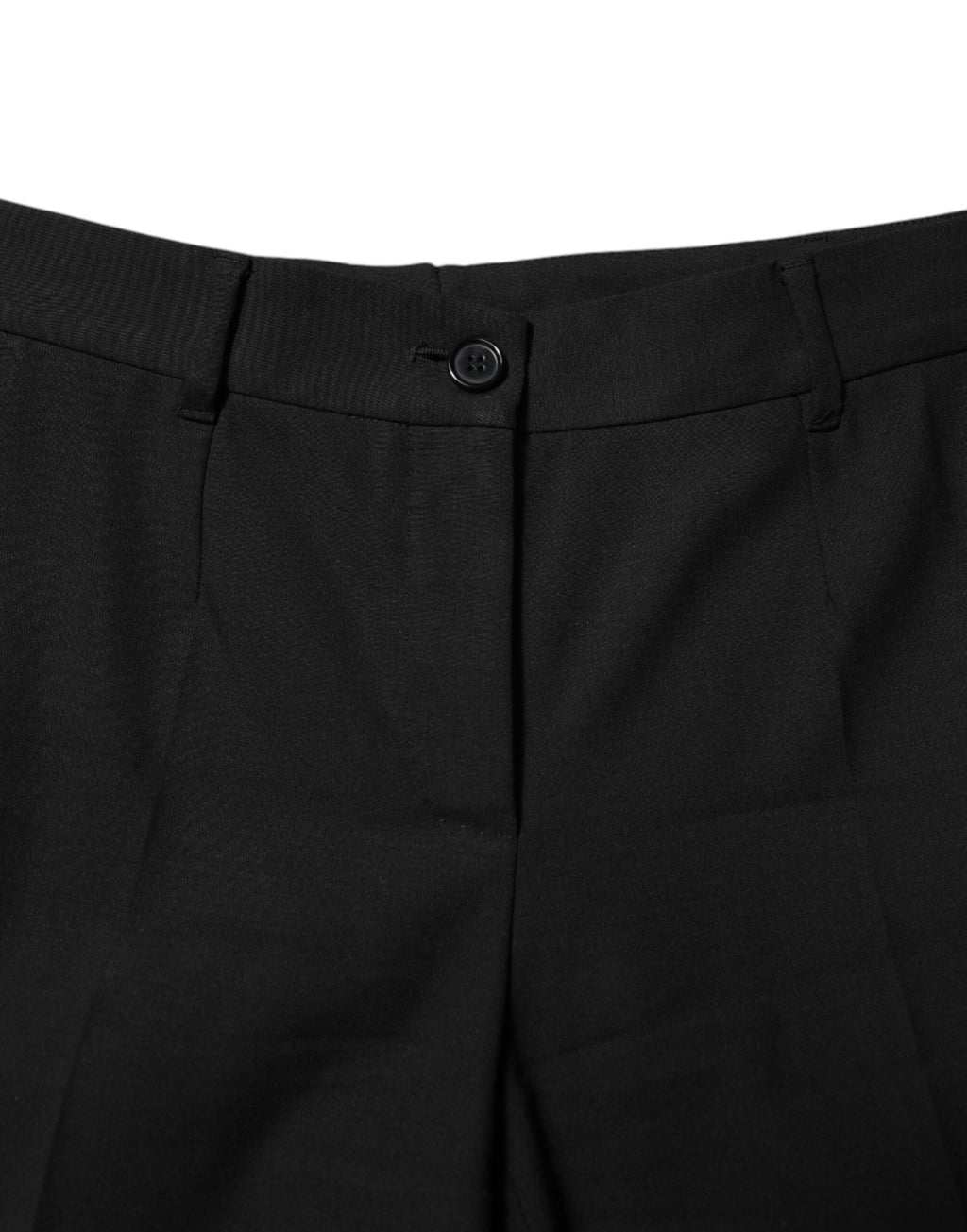 Pantalons en laine noire à taille haute et coupe tapered de Dolce & Gabbana, vue de face, détails de la texture en gros plan.