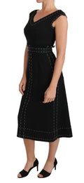 Robe droite en laine stretch noire de Dolce & Gabbana, coupe tendance et élégante pour femme.