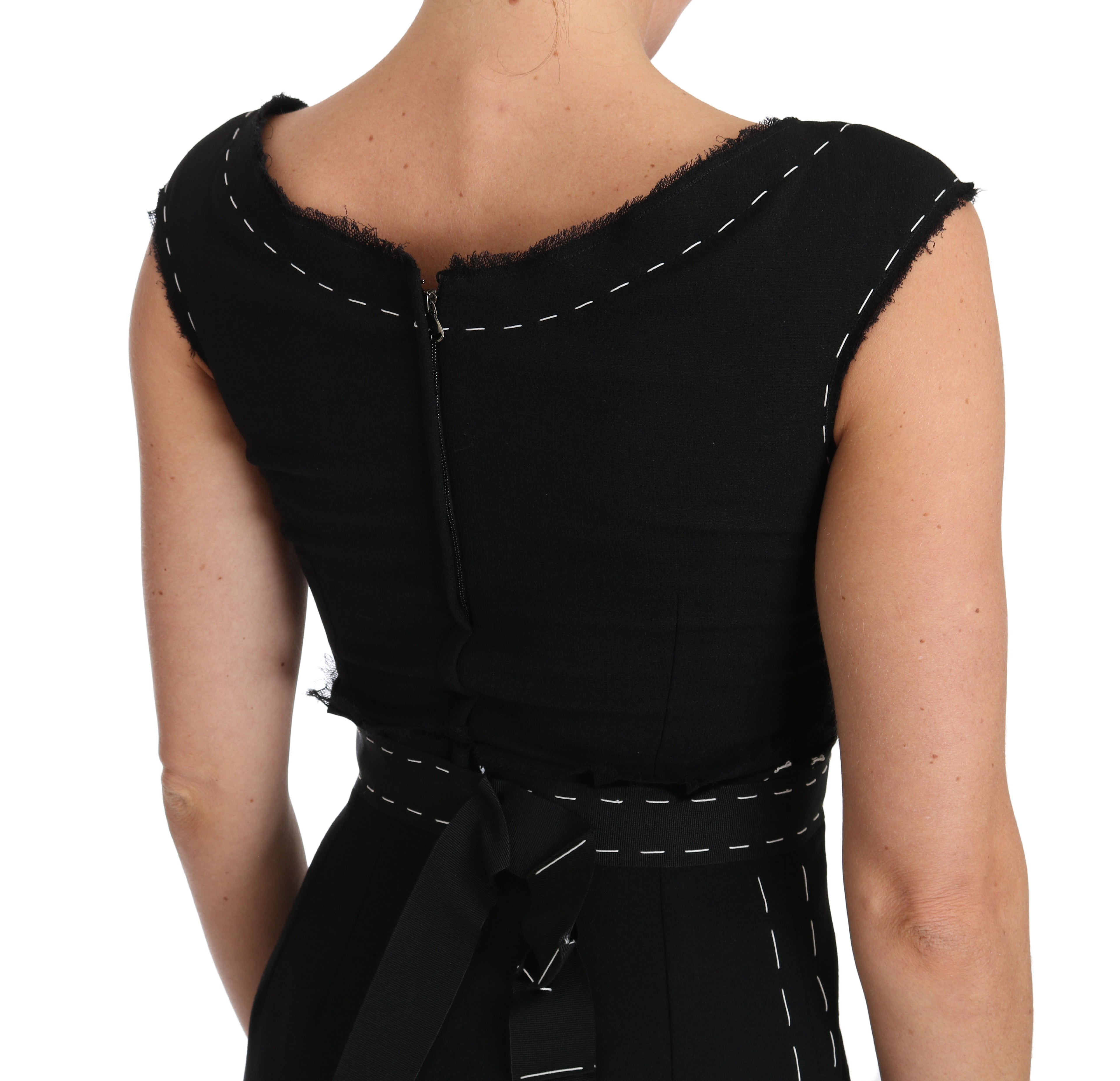 Robe en laine noire Dolce & Gabbana, coupe évasée et ajustée, style élégant et sophistiqué, vue de face.