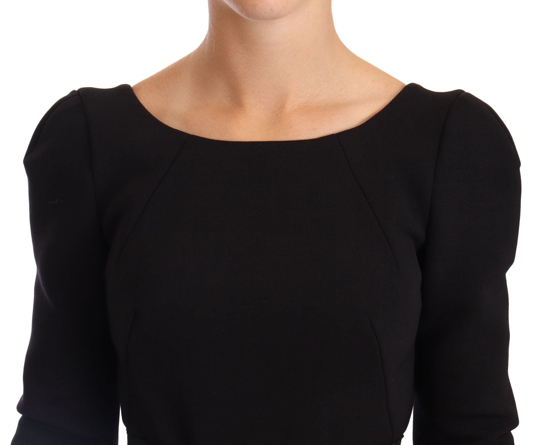 Robe ajustée en laine noire Dolce & Gabbana avec dos ouvert et coupe moulante, élégante et sophistiquée.