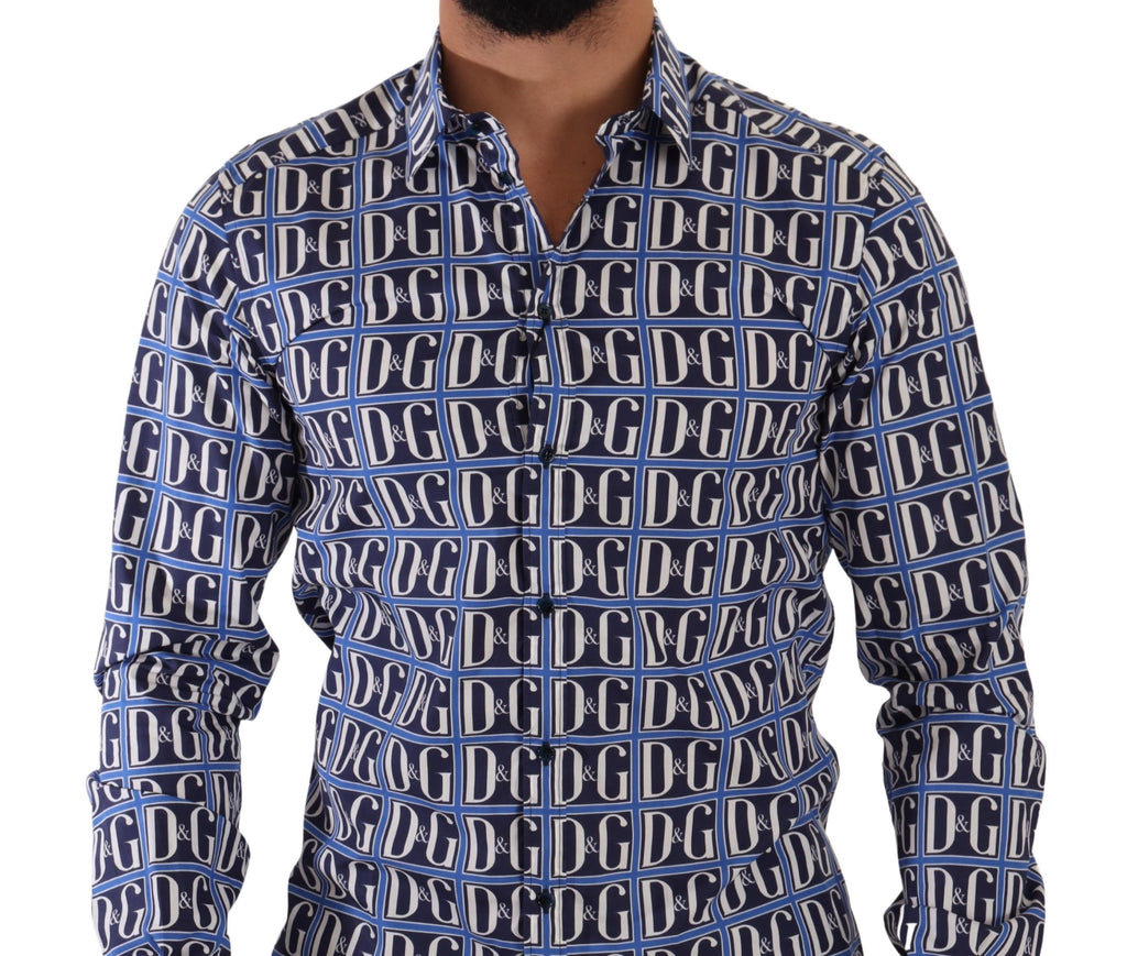 Chemise en coton bleu Dolce & Gabbana Logo Mania coupe slim, motif élégant, visible en détail sur cette image.