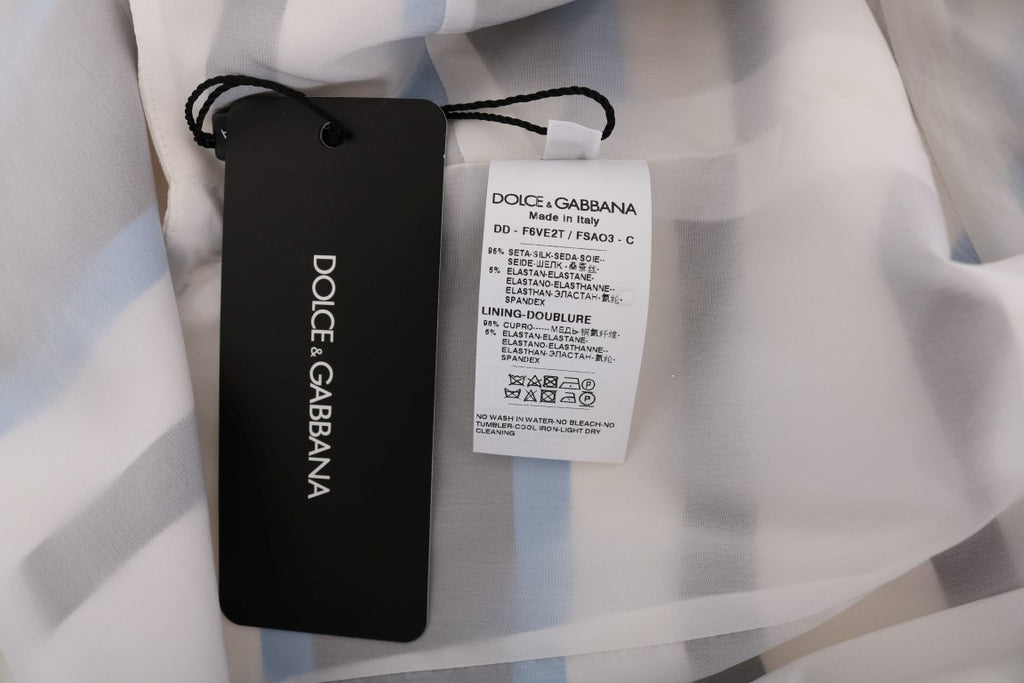 Robe chemise en soie à rayures bleues et blanches de Dolce & Gabbana, ajustée, élégante et fluide.