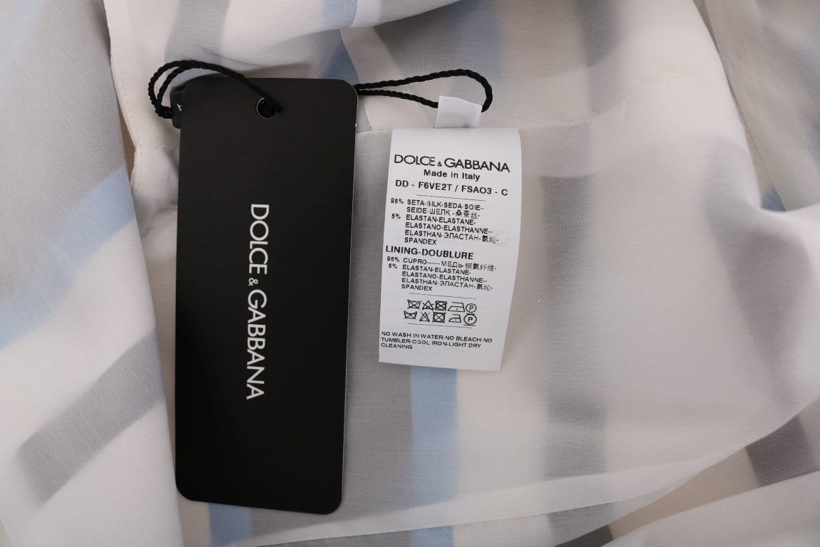 Robe chemise en soie à rayures bleues et blanches de Dolce & Gabbana, ajustée, élégante et fluide.