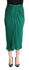 Jupe plissée verte foncée à taille haute de style midi et crayon par Dolce & Gabbana, vue de face.