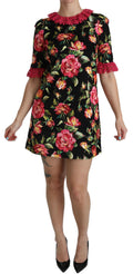 Robe courte Dolce & Gabbana en dentelle rose à fleurs, coupe trapèze et style élégant, vue de face.