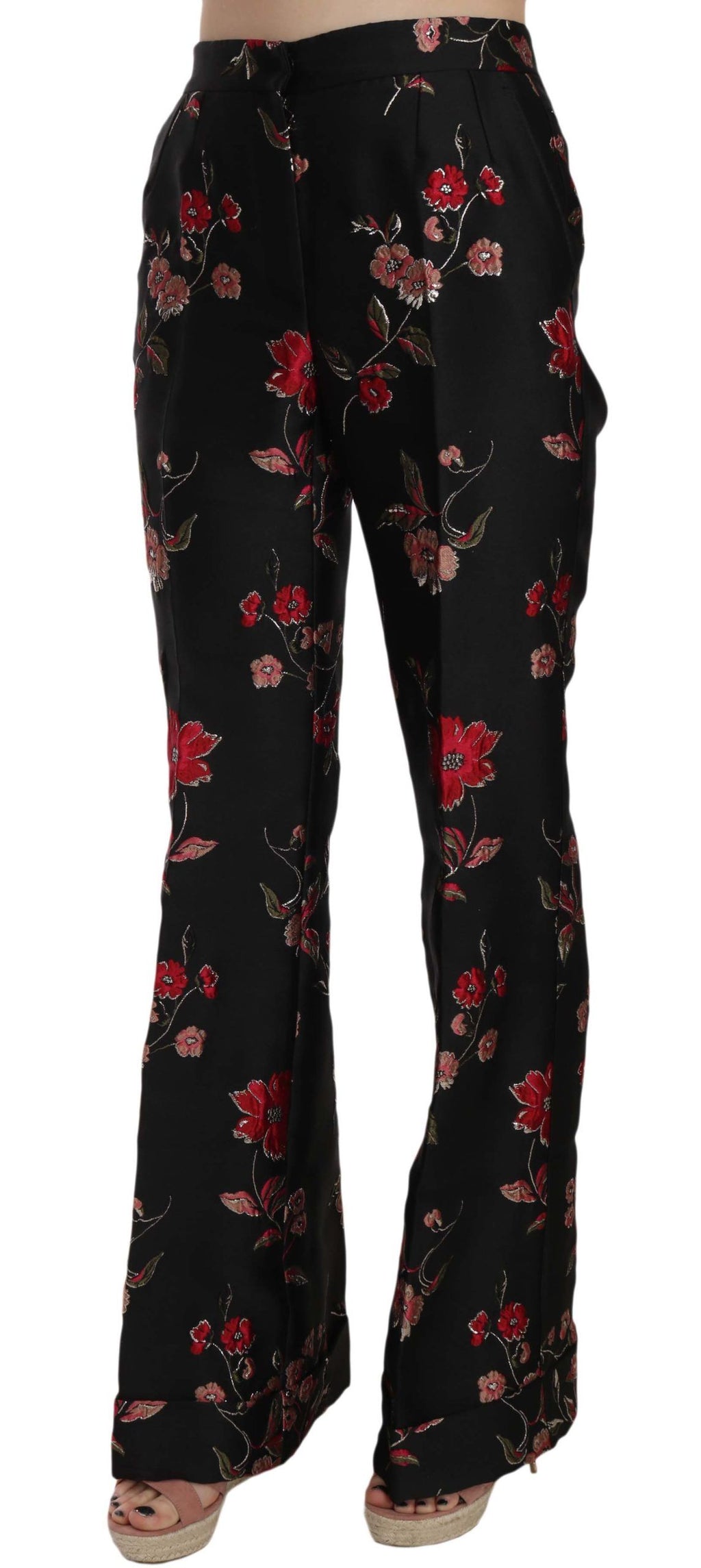 Pantalon noir à coupe boot cut Dolce & Gabbana avec imprimé floral, tissu fluide et détails élégants.