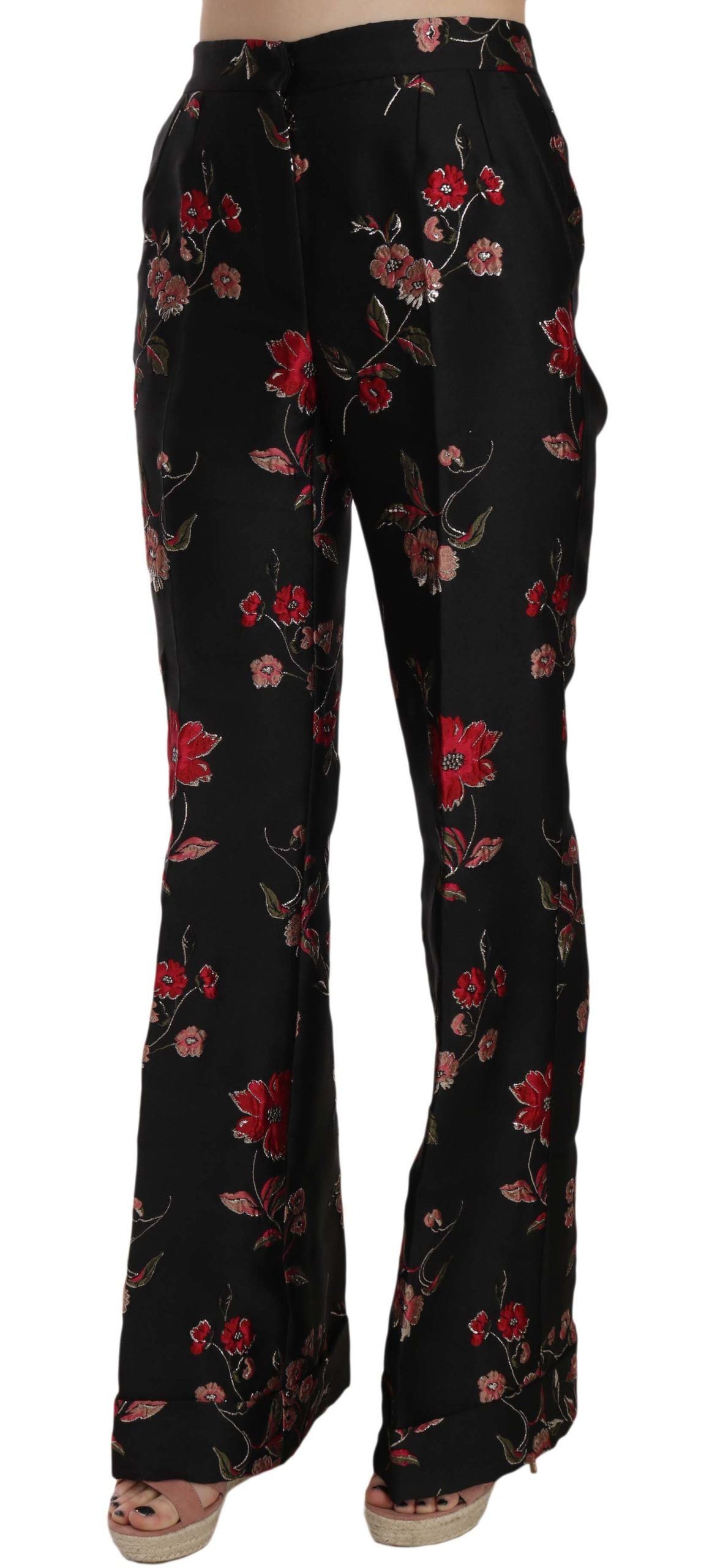 Pantalon noir à coupe boot cut Dolce & Gabbana avec imprimé floral, tissu fluide et détails élégants.