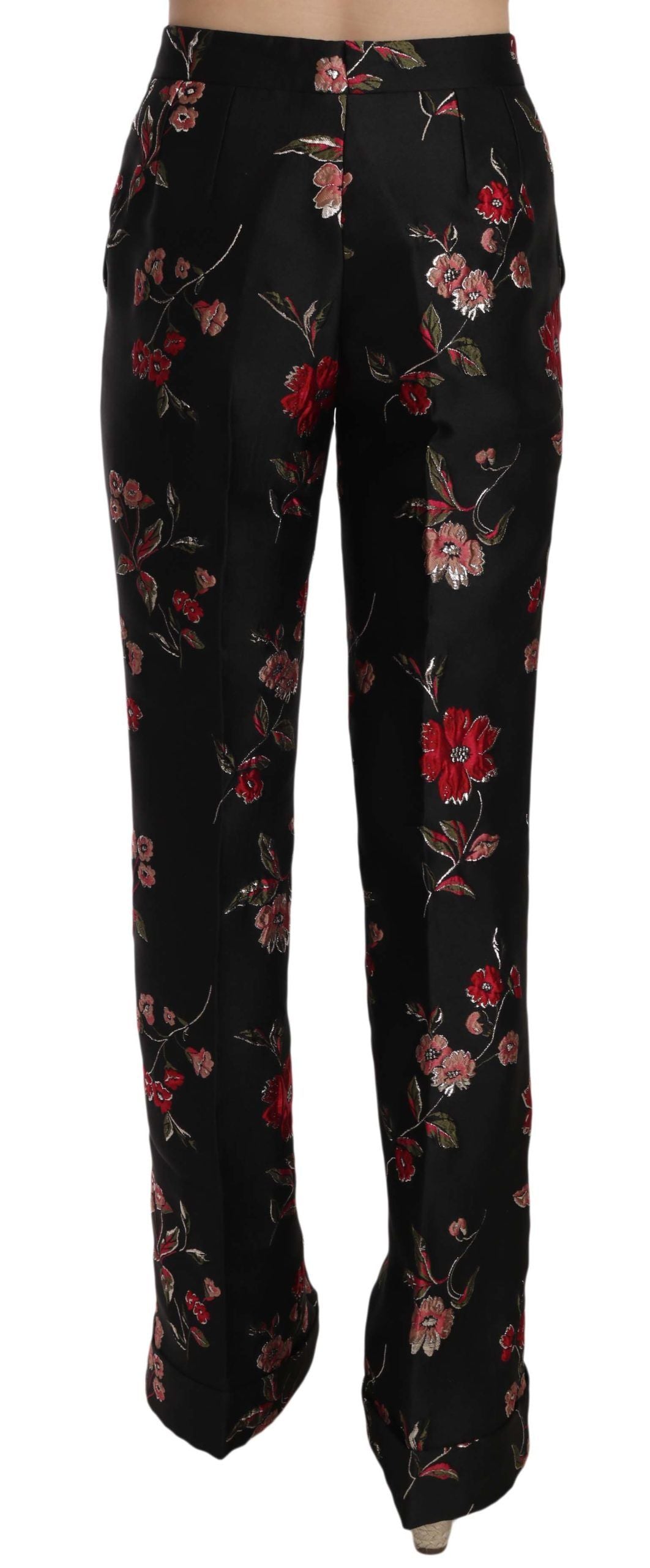 Pantalon noir à imprimé floral de coupe boot cut par Dolce & Gabbana, tissu élégant et style sophistiqué.