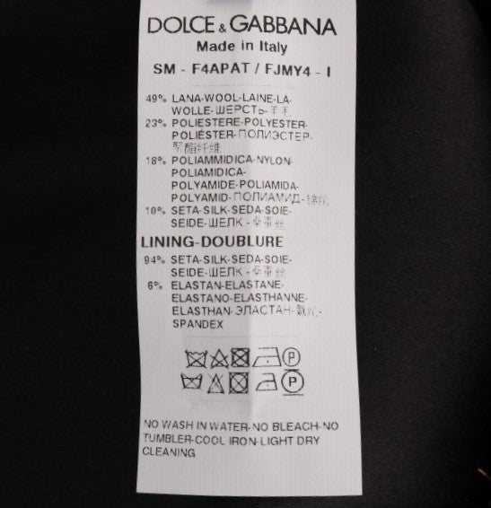 Mini jupe courte Dolce & Gabbana en or et noir, avec un style élégant et sophistiqué, visible en image 465286.