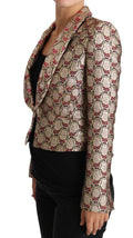 Blazer Dolce & Gabbana doré avec motifs floraux en sequins, veste élégante à manches longues et col en satin doré.