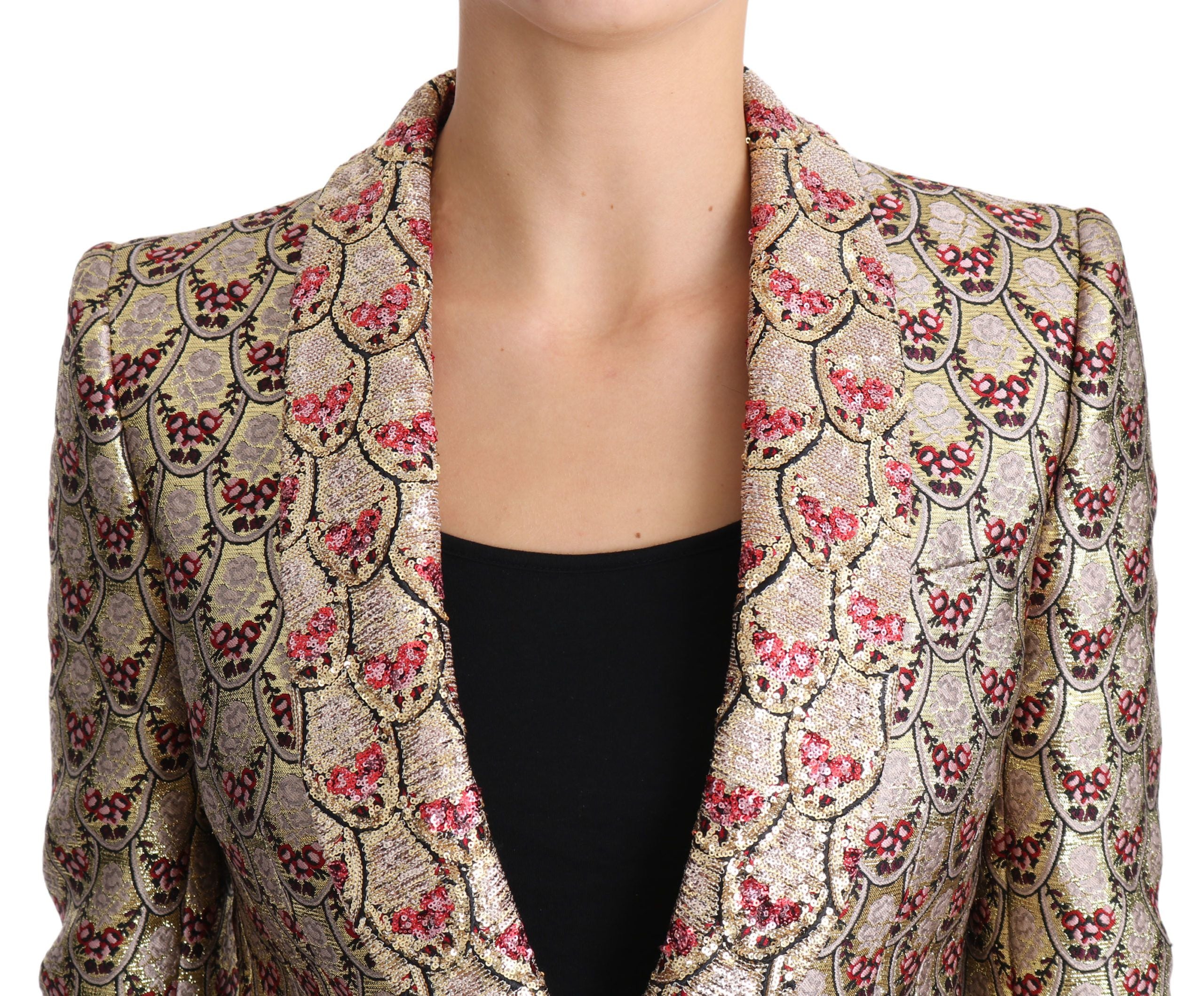 Veste blazer Dolce & Gabbana or et florale à sequins dorés, élégante et chic, portée sur un mannequin.