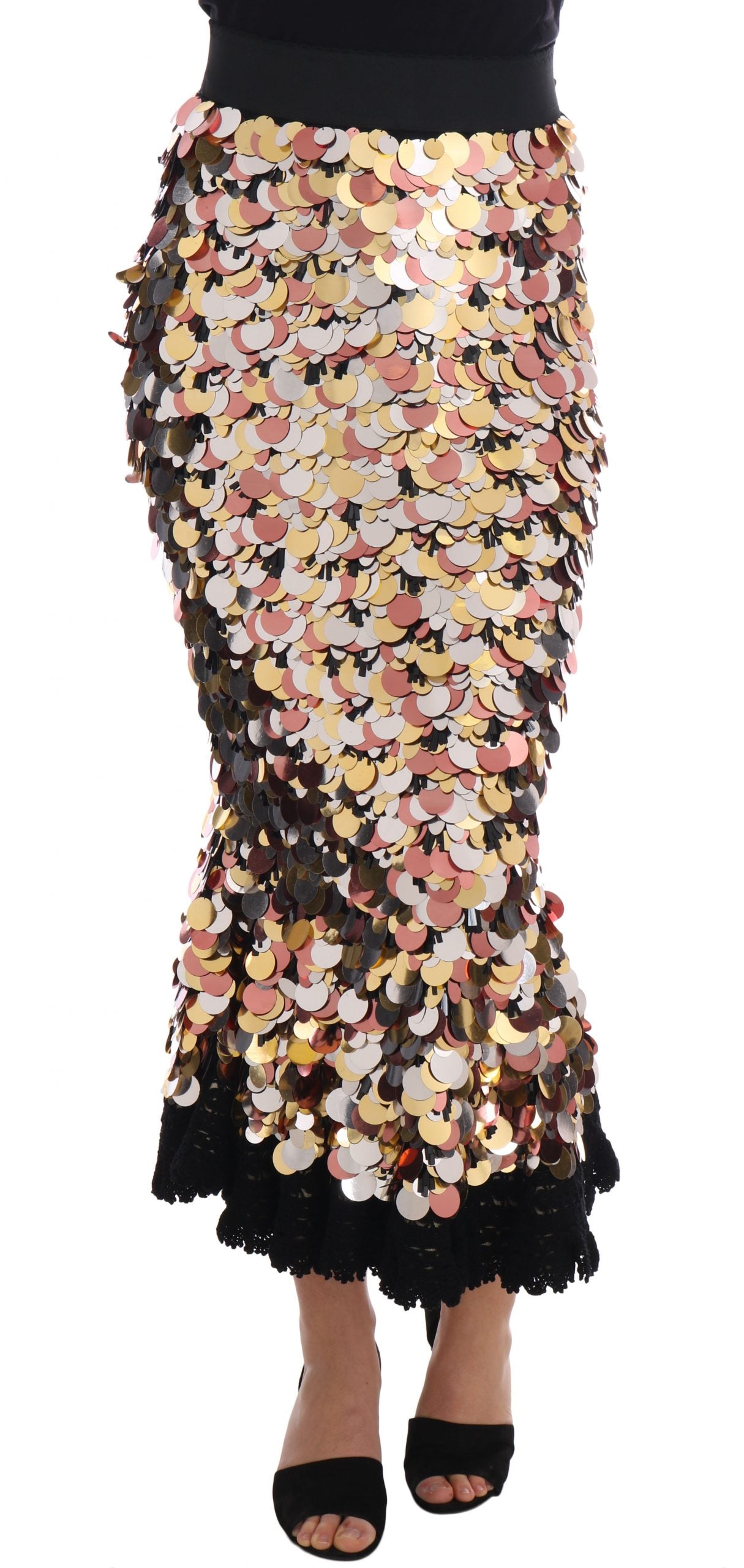 Jupe dorée à sequins Dolce & Gabbana avec peplum et taille haute, portée élégante, vue de face.