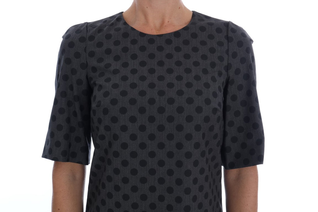 Robe en laine gris à pois Dolce & Gabbana, élégante et ajustée, en tissu stretch avec motif à pois sur toute la robe.