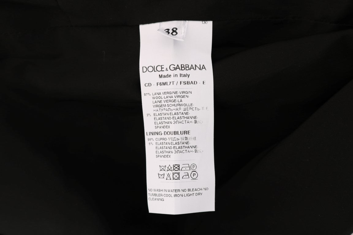 Robe en laine gris à pois Dolce & Gabbana, ajustée, avec col en V et manches longues, élégante et sophistiquée.
