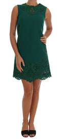 Robe en soie et laine verte à fleurs avec découpes, Dolce & Gabbana, vue de face.
