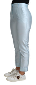 Pantalons en soie Dolce & Gabbana Light Blue, coupe cropped et tapered, affichés dans une image élégante et moderne.