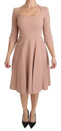 Robe Dolce & Gabbana rose à manches 3/4, coupe trapèze en viscose, vue de face, élégante et féminine.