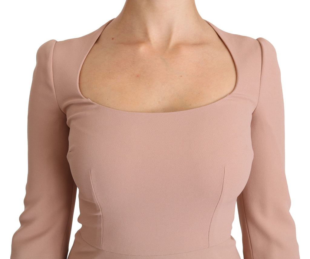 Robe Dolce & Gabbana rose à manches 3/4, coupe évasée en viscose, détail élégant et féminin.