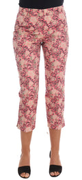 Pantalons Capri en brocart floral rose de Dolce & Gabbana, style élégant et féminin, détails visibles en tissu coloré.