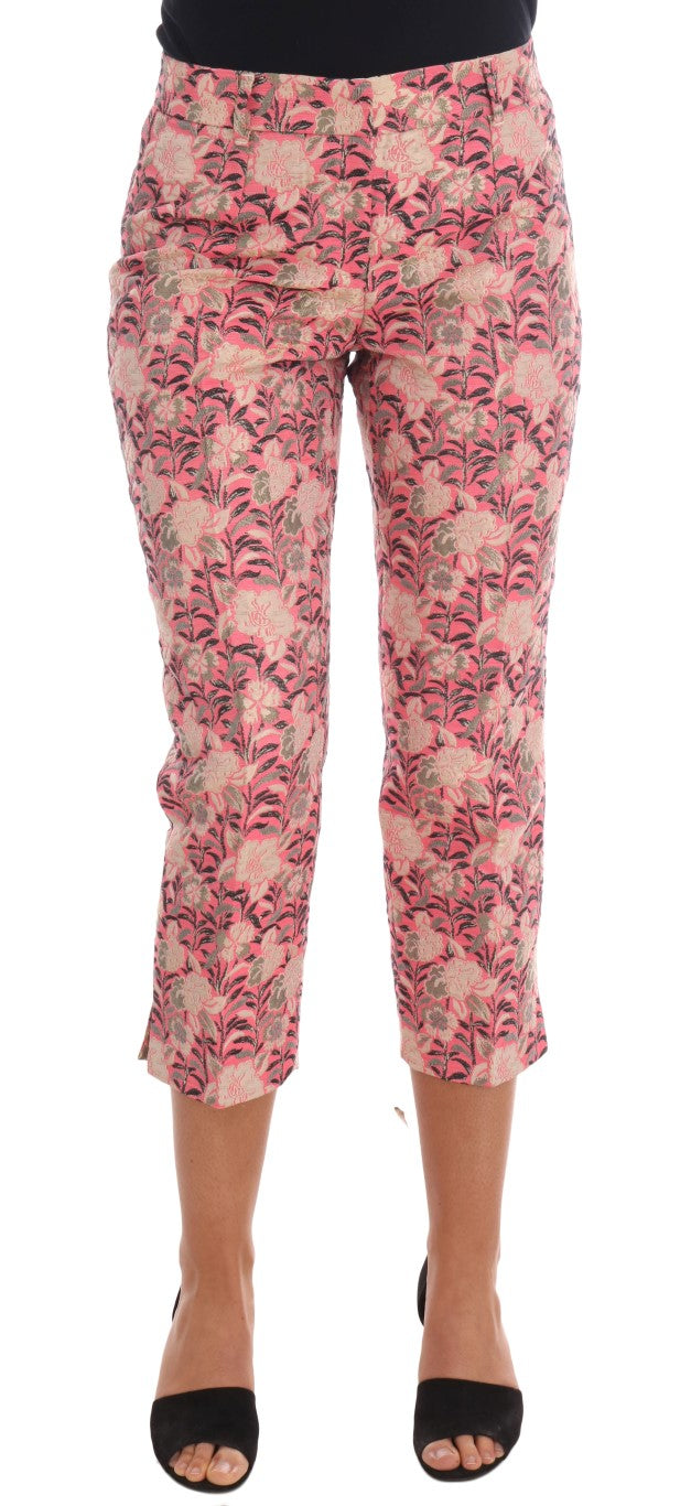 Pantalons Capri en brocart floral rose de Dolce & Gabbana, style élégant et féminin, détails visibles en tissu coloré.