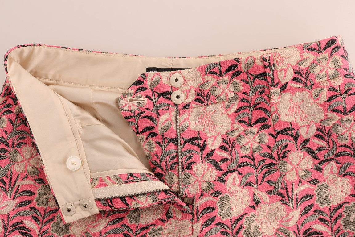 Pantalons Capri en brocart floral rose Dolce & Gabbana, élégants et sophistiqués, avec motif floral coloré et coupe ajustée.