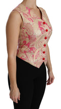 Gilet en brocart rose doré de Dolce & Gabbana, veston élégant avec détails raffinés, porté avec blouse ou haut.