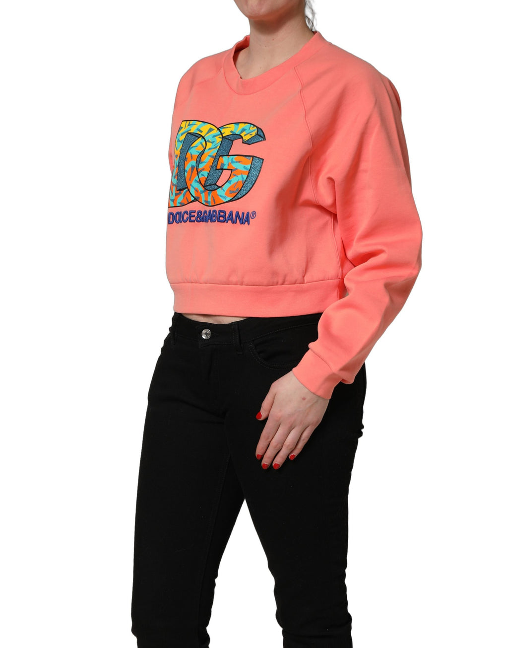 Sweat-shirt cropped Dolce & Gabbana rose graphique à col rond, pull en coton rose clair, style décontracté et tendance.
