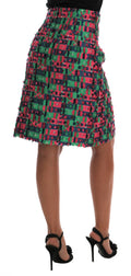 Jupe crayon en jacquard rose et vert de Dolce & Gabbana, tissu élégant avec motif sophistiqué.