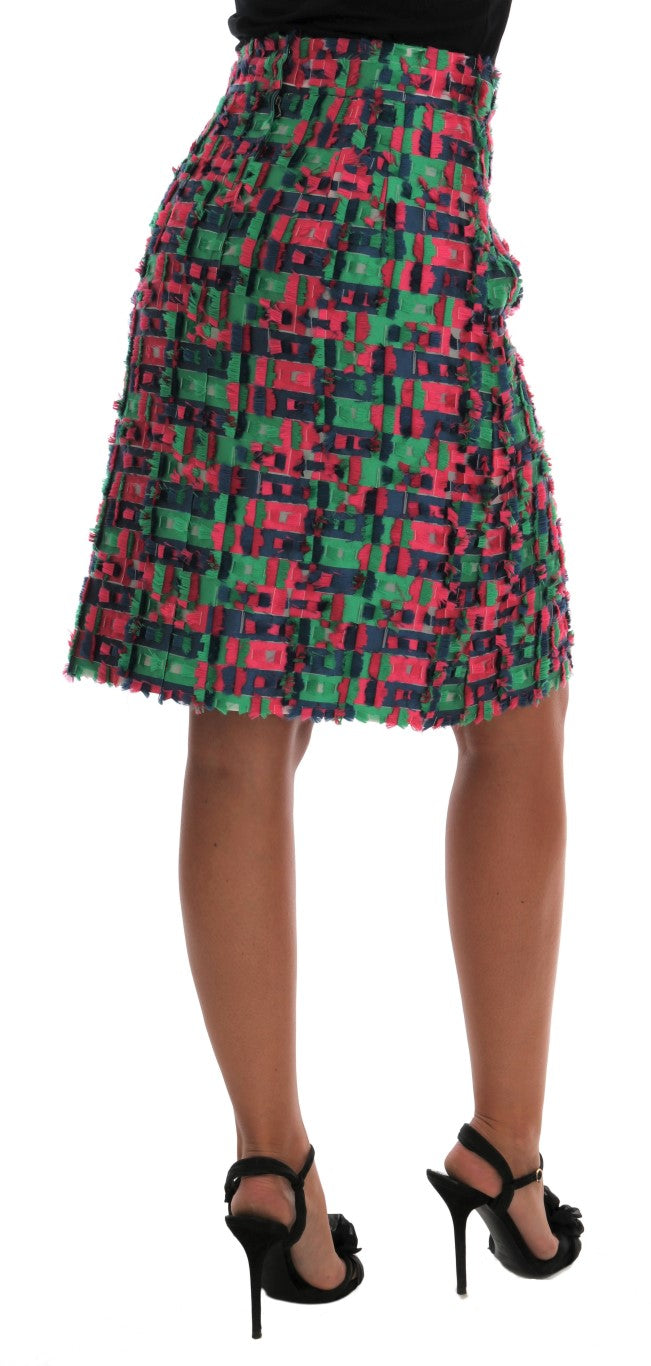 Jupe crayon en jacquard rose et vert de Dolce & Gabbana, tissu élégant avec motif sophistiqué.