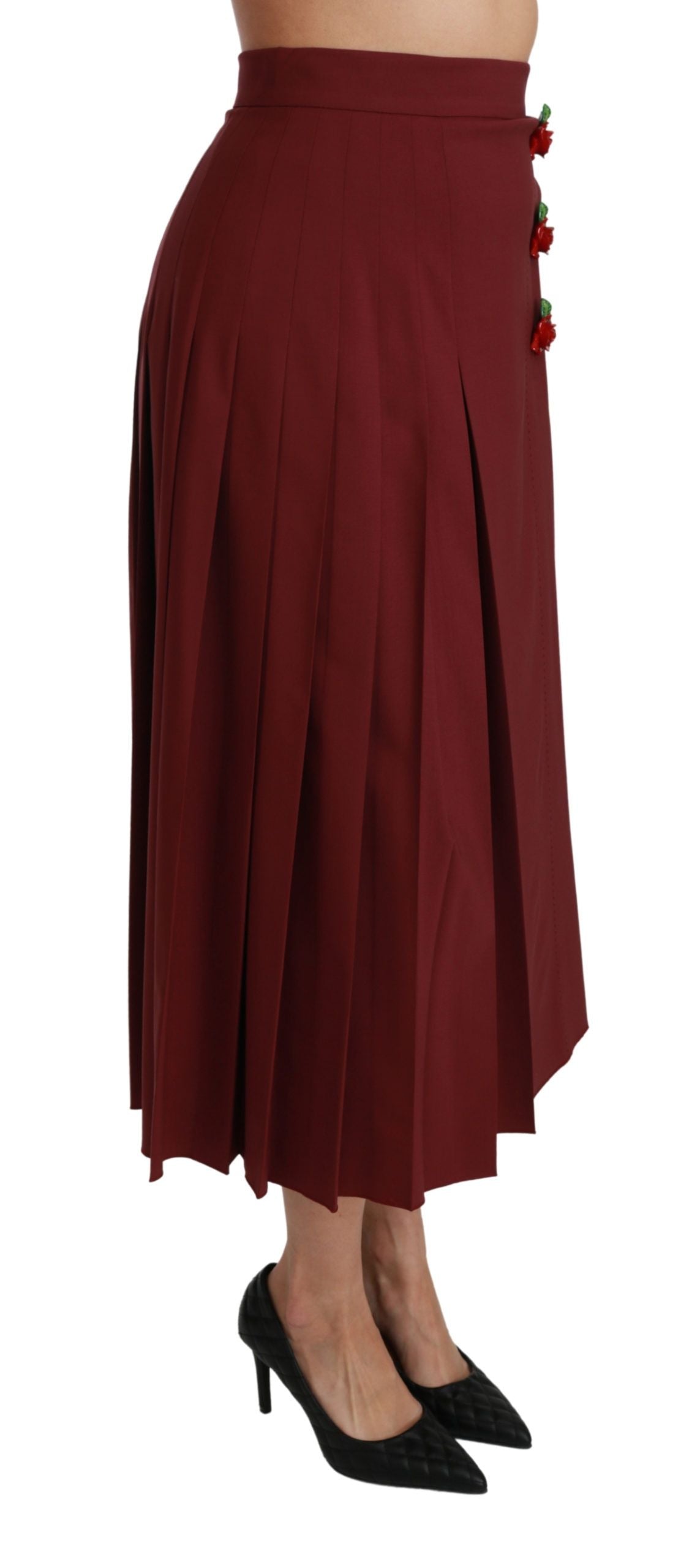 Jupe longue plissée rouge à taille haute en laine de marque Dolce & Gabbana, vue de face.