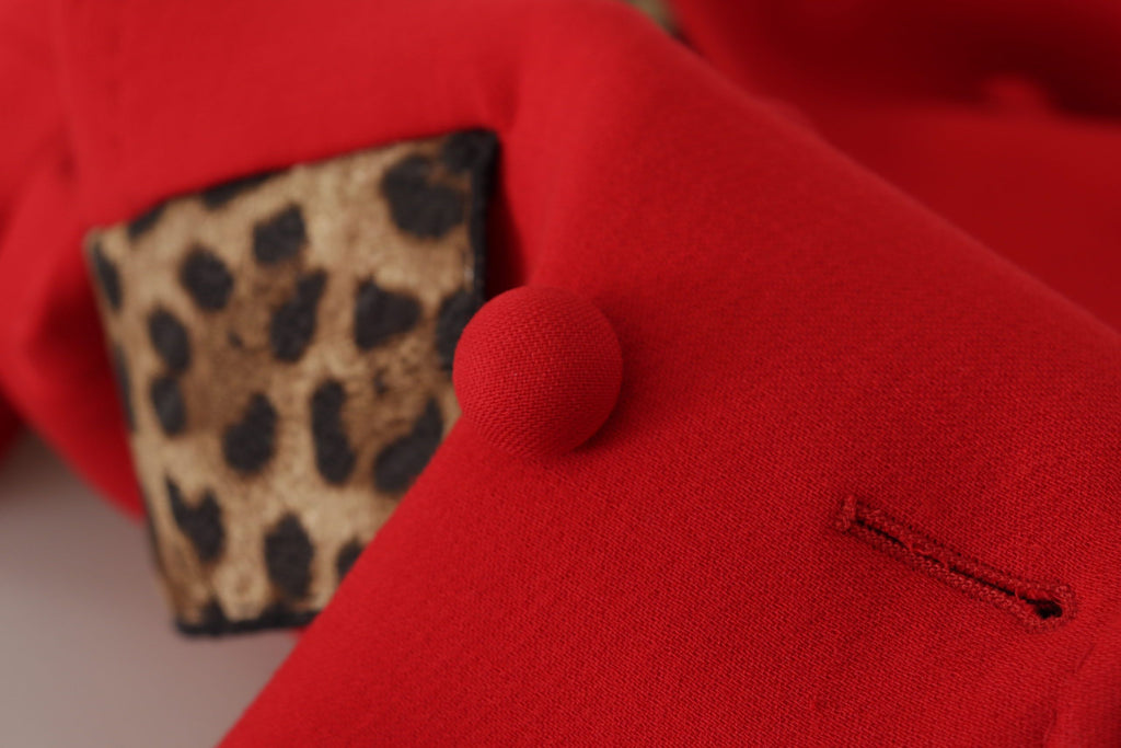 Manteau trench en laine rouge à motif léopard Dolce & Gabbana, veste élégante avec ceinture et détails sophistiqués.